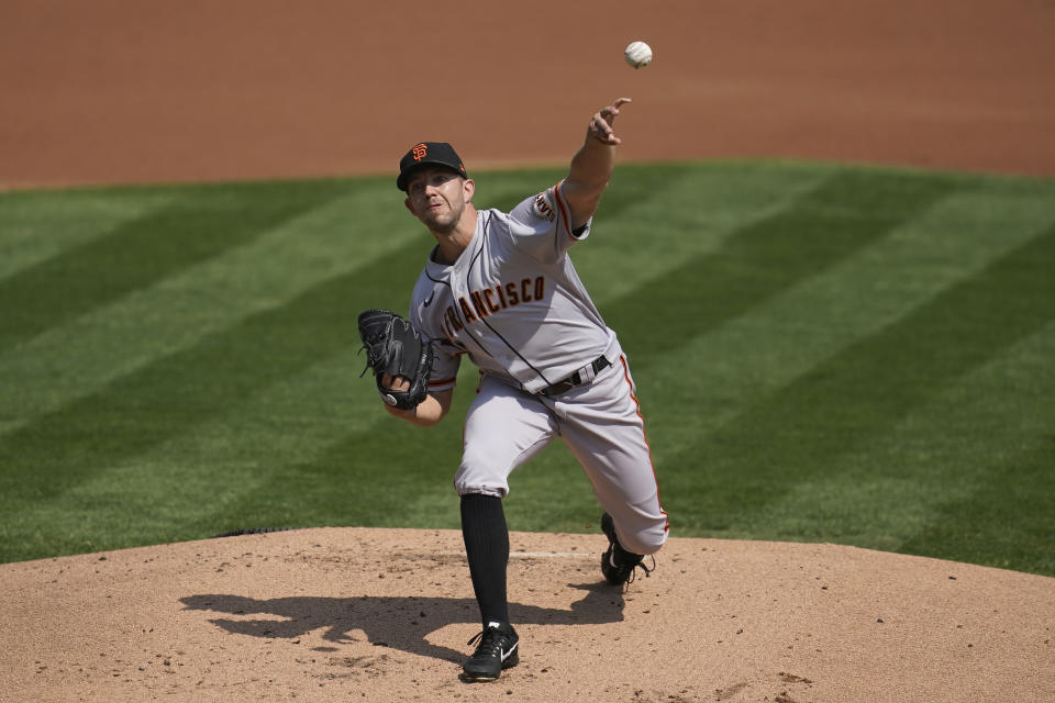 San Francisco Giants' Tyler Anderson pitches against the Oakland Athletics during the first inning of a baseball game in Oakland, Calif., Sunday, Sept. 20, 2020. (AP Photo/Jeff Chiu)