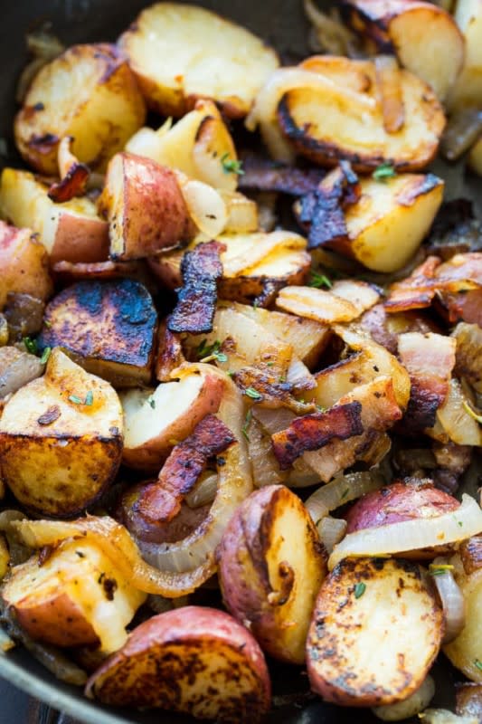 <p>Spicy Southern Kitchen</p><p>Bacon-braised red potatoes make an easy side dish and they have tons of bacon flavor and are also flavored with onion and thyme.</p><p><strong>Get the recipe: <a href="https://spicysouthernkitchen.com/bacon-braised-red-potatoes/" rel="nofollow noopener" target="_blank" data-ylk="slk:Bacon-Braised Red Potatoes;elm:context_link;itc:0;sec:content-canvas" class="link rapid-noclick-resp">Bacon-Braised Red Potatoes</a></strong></p>