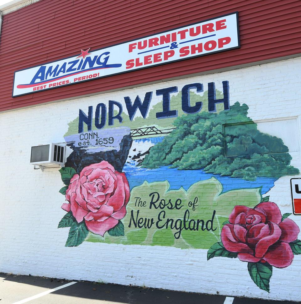 A mural on Amazing Furniture & Sleep Shop in downtown Norwich.