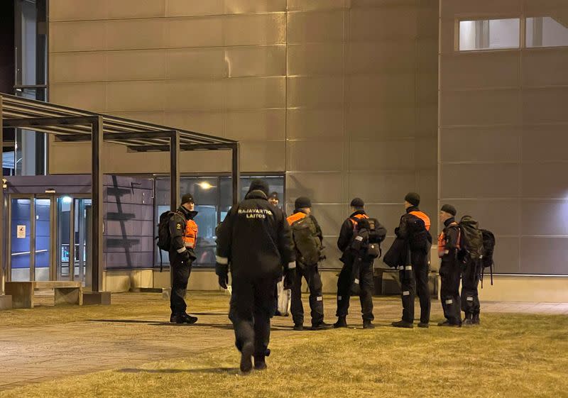 Finish border guards wait at the Nuijamaa border checkpoint in Finland