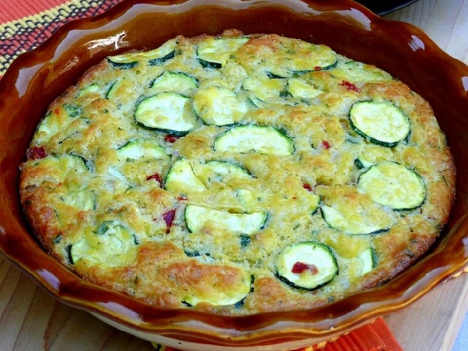 <p>Noble Pig</p><p>No fancy crust is necessary for this delicious Zucchini-Shallot-Roasted Red Pepper Pie. Just stir it all together and it bakes to perfection. Get the recipe for <strong><a href="https://noblepig.com/2012/07/zucchini-shallot-roasted-red-pepper-pie/" rel="nofollow noopener" target="_blank" data-ylk="slk:Zucchini Shallot Roasted Red Pepper Pie;elm:context_link;itc:0;sec:content-canvas" class="link ">Zucchini Shallot Roasted Red Pepper Pie</a></strong>.</p>