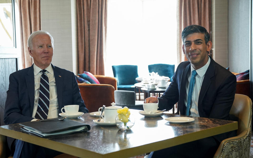 U.S. President Joe Biden meets British Prime Minister Rishi Sunak at the Grand Central Hotel, Belfast, Northern Ireland April 12, 2023. REUTERS/Kevin Lamarque