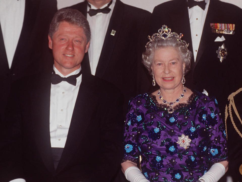 Queen Elizabeth is joined by U.S. President Bill Clinton at a banquet held during 50th anniversary D-Day Commemorations at Portsmouth Guildhall, June 4, 1994.  / Credit: Tim Graham Photo Library via Getty Images