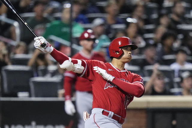 Los Angeles Angels designated hitter Shohei Ohtani wears his elbow brace at  first base after hitting a single in the fifth inning during the Major  League Baseball game against the Kansas City