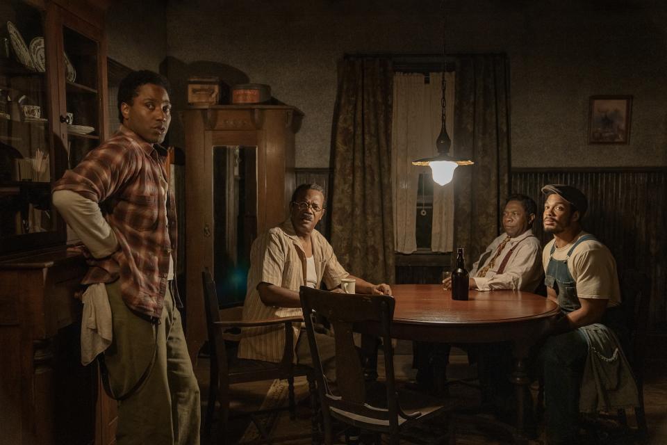 The Piano Lesson. (L-R) John David Washington as Boy Willie, Samuel L. Jackson as Doaker Charles, Michael Potts as Wining Boy and Ray Fisher as Lymon in The Piano Lesson. Cr. David Lee/Netflix © 2024