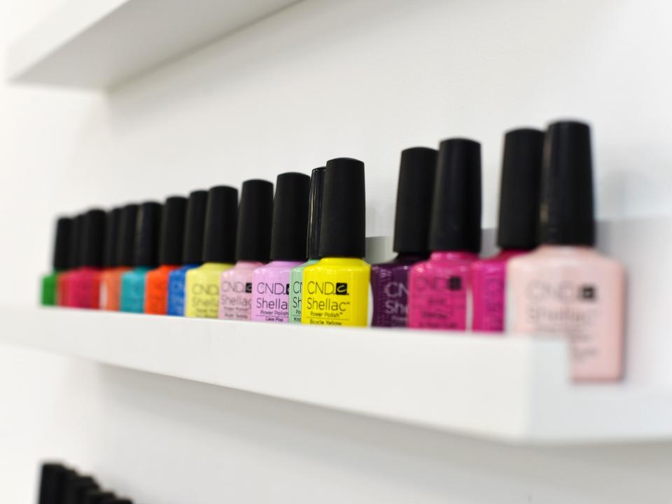 Nail polish displayed on a shelf.