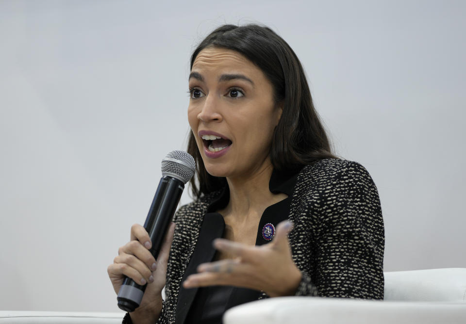 U.S. Rep. Alexandria Ocasio-Cortez speaks at an event at the US Climate Action Center at the COP26 U.N. Climate Summit in Glasgow, Scotland, Tuesday, Nov. 9, 2021. The U.N. climate summit in Glasgow has entered it's second week as leaders from around the world, are gathering in Scotland's biggest city, to lay out their vision for addressing the common challenge of global warming. (AP Photo/Alastair Grant)