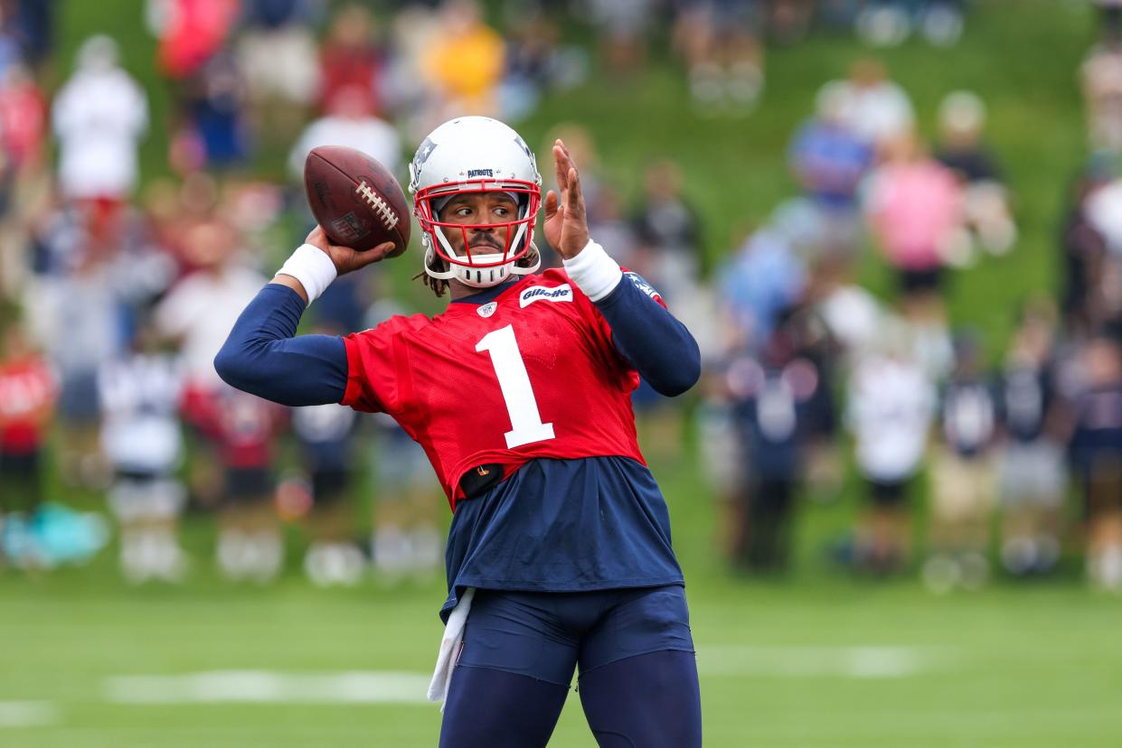 Patriots quarterback Cam Newton prepares to thrown during training camp Wednesday in Foxboro.