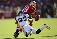 SAN FRANCISCO, CA - NOVEMBER 11: Ted Ginn Jr #19 of the San Francisco 49ers returning a kickoff has the ball stripped away by Bradley Fletcher #32 of the St. Louis Rams during the first quarter of an NFL football game at Candlestick Park on November 11, 2012 in San Francisco, California. The 49ers recovered the the ball on the play. (Photo by Thearon W. Henderson/Getty Images)