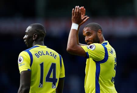 Britain Soccer Football - West Bromwich Albion v Everton - Premier League - The Hawthorns - 20/8/16 Everton's Ashley Williams applauds fans after the match with Yannick Bolasie Action Images via Reuters / Jason Cairnduff