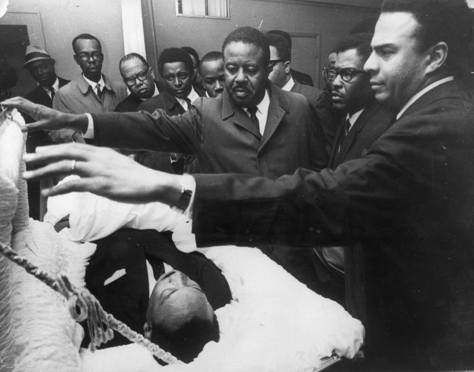 The body of the assassinated Dr. Martin Luther King Jr. lying in state in Memphis, Tennessee. (Credit: Keystone/Getty Images)