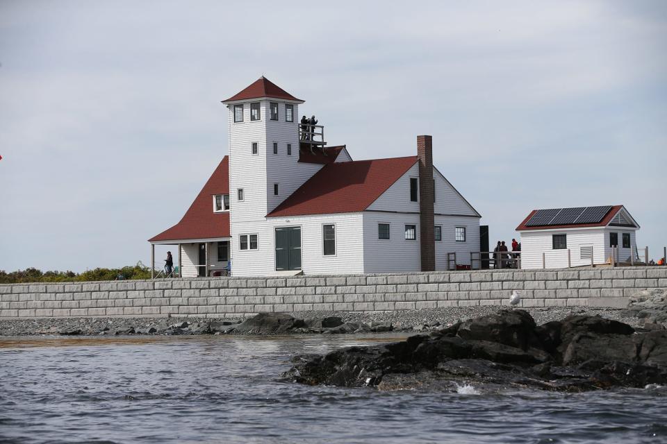 The fully restored 1930s rescue boat Mervin F Roberts was relaunched Sept. 30, 2022 as an 8 person crew plus a coxswain rowed her to Wood Island U.S. Life Saving Station.