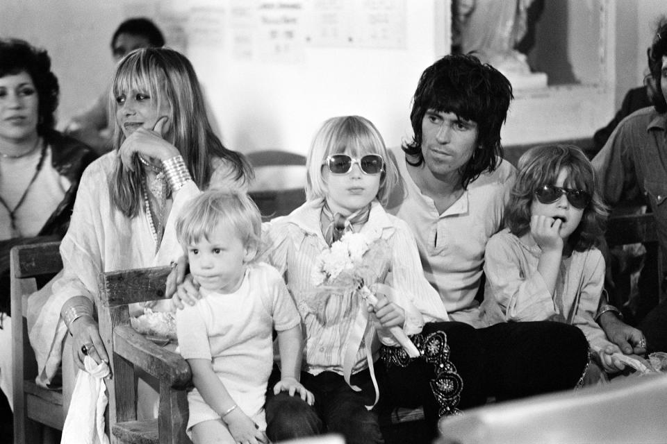 English musician Keith Richards with his partner Anita Pallenberg and children at the wedding of Mick Jagger and Nicaraguan-born Bianca De Macias in Saint-Tropez, France, 12th May 1971.  (Photo by Reg Lancaster/Daily Express/Getty Images)