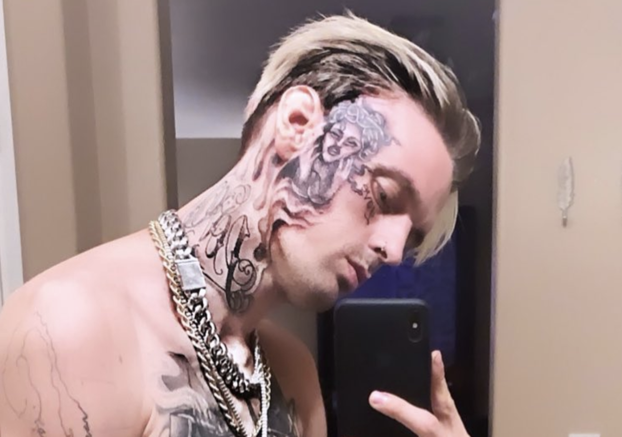 Aaron Carter has a gigantic new face tattoo —?and it could have been even larger, his tattoo artist says. (Screenshot: Aaron Carter via Instagram)