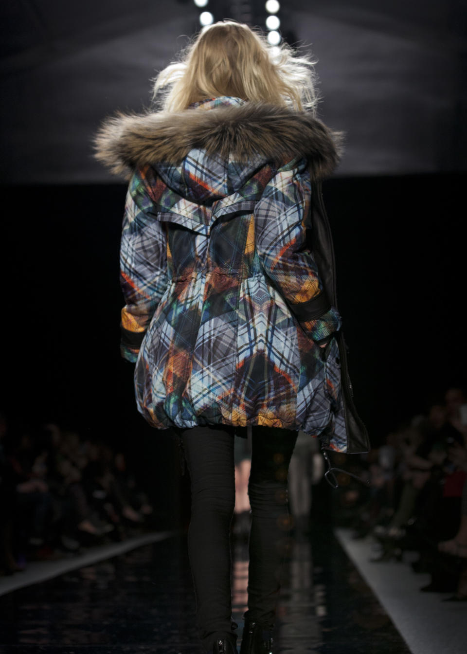 A model walks the runway during the Nicole Miller Fall 2013 fashion show during Fashion Week, Friday, Feb. 8, 2013, in New York. (AP Photo/Karly Domb Sadof)