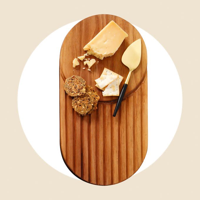 <a href="https://www.etsy.com/listing/1046786145/ray-serving-board-cheese-board" rel="nofollow noopener" target="_blank" data-ylk="slk:Ray Serving Board;elm:context_link;itc:0;sec:content-canvas" class="link rapid-noclick-resp">Ray Serving Board</a>