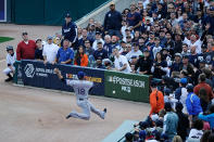 DETROIT, MI - OCTOBER 13: Mitch Moreland #18 of the Texas Rangers tries to catch a foul ball against the Detroit Tigers in Game Five of the American League Championship Series at Comerica Park on October 13, 2011 in Detroit, Michigan. (Photo by Kevork Djansezian/Getty Images)