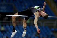 <p>Derek Drouin of Canada competes during the Men’s High Jump Final on Day 11 of the Rio 2016 Olympic Games at the Olympic Stadium on August 16, 2016 in Rio de Janeiro, Brazil. (Photo by Ian Walton/Getty Images) </p>