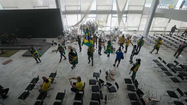 PHOTO: Protesters, supporters of Brazil's former President Jair Bolsonaro, storm the Planalto Palace in Brasilia, Brazil, Jan. 8, 2023. (Eraldo Peres/AP)