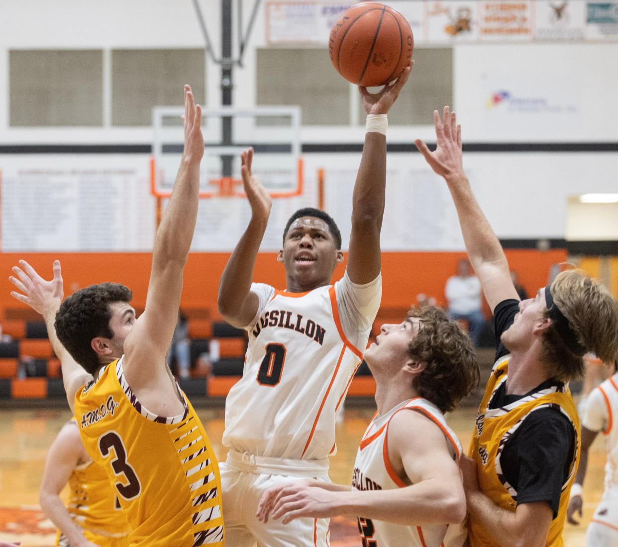 Massillon's Jalen Slaughter shoots in the first half vs. Walsh Jesuit.