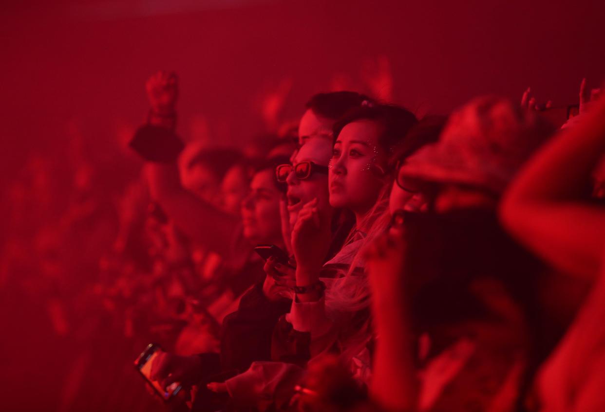 Fans watch as Bizarrap performs in the Sahara tent at the Coachella Valley Music and Arts Festival in Indio, Calif., Friday.