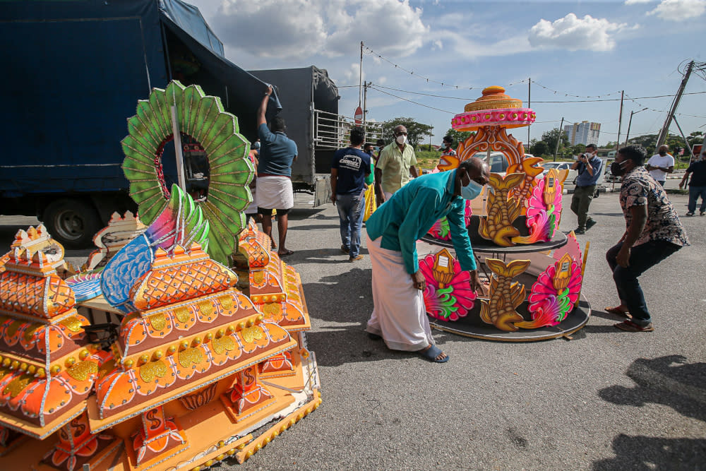 Kavadi makers and bearers in Ipoh with their completed kavadi in Ipoh, Perak, January 14, 2022. — Picture by Farhan Najib