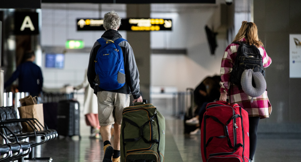 Aussie travellers at the airport. 