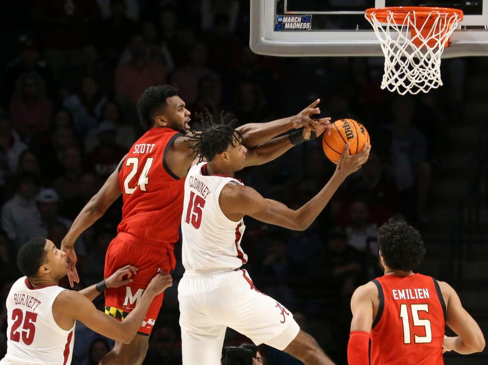Mar 18, 2023; Birmingham, AL, USA; Alabama forward Noah Clowney (15) grabs a rebound away from Maryland forward Donta Scott (24) at Legacy Arena during the second round of the NCAA Tournament. Mandatory Credit: Gary Cosby Jr.-Tuscaloosa News
