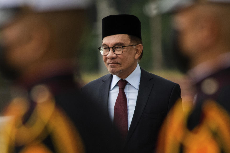Malaysian Prime Minister Anwar Ibrahim attends a wreath-laying ceremony at Rizal Park in Manila, Philippines Thursday, March 2, 2023. (Lisa Marie David/Pool Photo via AP)