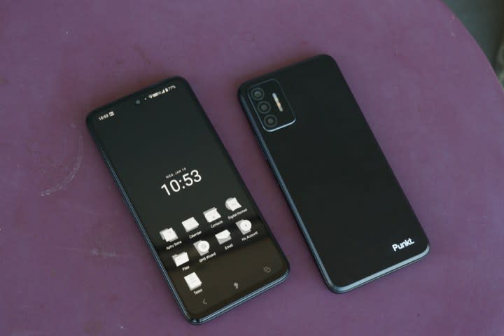 Two Apostrophy OS smartphones lying on a table next to each other.