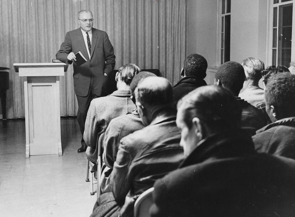 The Rev. C.C. Thomas preaches to men at the Haven of Rest on March 29, 1958, in Akron.