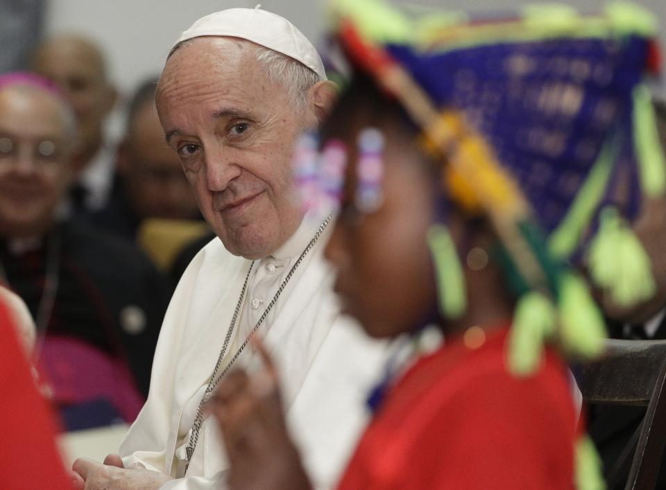Pope Francis meets migrants at the diocesan Caritas center in Rabat, Morocco, Saturday, March 30, 2019. Francis's weekend trip to Morocco aims to highlight the North African nation's tradition of Christian-Muslim ties while also letting him show solidarity with migrants at Europe's door and tend to a tiny Catholic flock on the peripheries. (AP Photo/Gregorio Borgia)