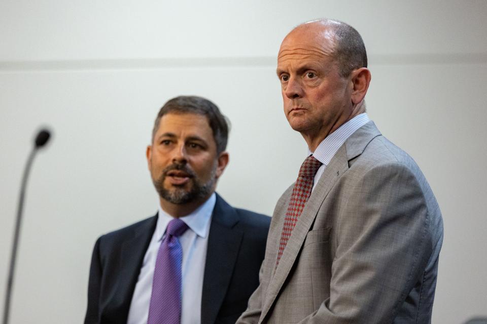 Donna Adelson’s defense lawyers Alex Morris, right, and Daniel Rashbaum chat with one another ahead of a hearing for Adelson on Monday, Feb. 12, 2024.