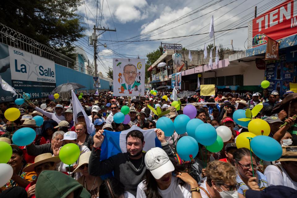 Supporters of the presidential candidate for Movimiento Semilla, Bernardo Arévalo await the arrival of the candidate in Huehuetenango on Aug.12, 2023.