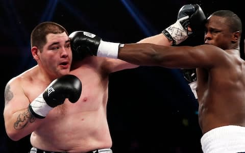 Mexico's Andy Ruiz Jr., left, exchanges punches with Tor Hamer - Credit: AP