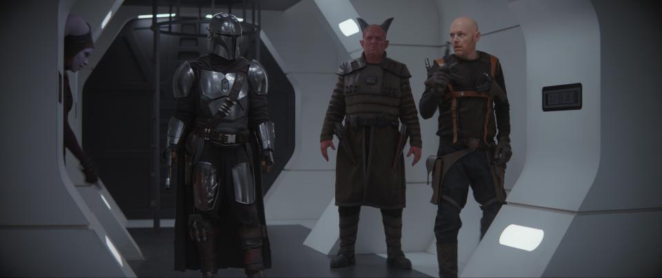 Pedro Pascal is the Mandalorian, Clancy Brown is Burg and Bill Burr is Mayfeld in THE MANDALORIAN, exclusively on Disney+