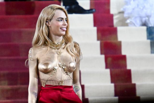 Cara Delevingne attended the Met Gala topless and painted in gold