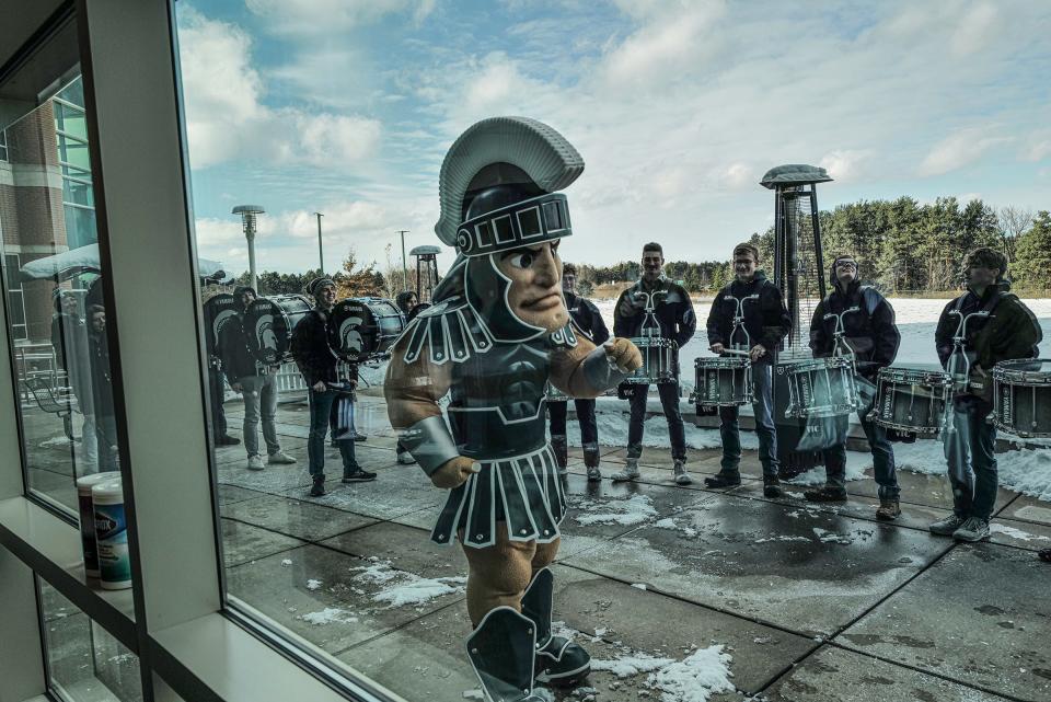 Sparty and the Michigan State University drum line entertain the members at the MSU Federal Credit Union's 85th anniversary celebration Sunday, Nov. 20, 2022.