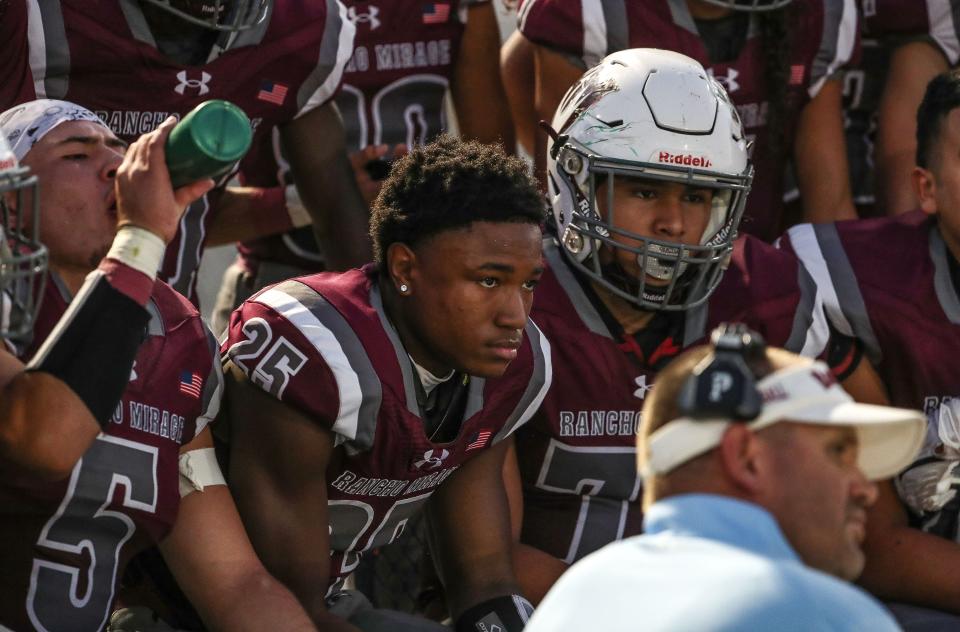Rancho Mirage running back Jeremiah Williams, 25 listens to the coaching staff during the Rattlers loss to Norte Vista in Rancho Mirage, Calif., Sept. 7, 2023.