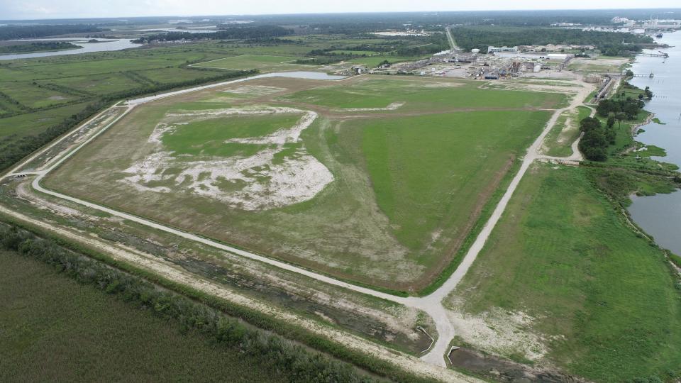 Land at the SeaPoint Industrial Terminal Complex which has been cleaned. This field used to house two large wastewater retention ponds.
