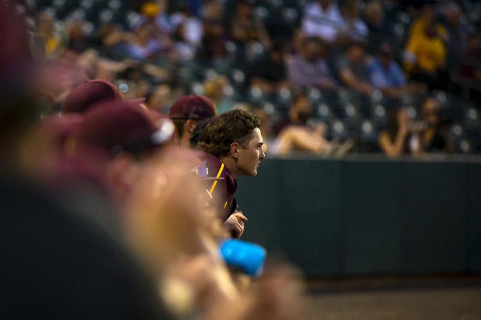 ASU's Joe Lampe (5) watches his teammates from the dugout during a home game against UNLV held at Phoenix Municipal Stadium on Apr. 26, 2022.