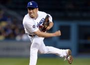 FILE PHOTO: May 15, 2019; Los Angeles, CA, USA; Los Angeles Dodgers starting pitcher Kenta Maeda (18) throws against the San Diego Padres during the sixth inning at Dodger Stadium. Gary A. Vasquez-USA TODAY Sports