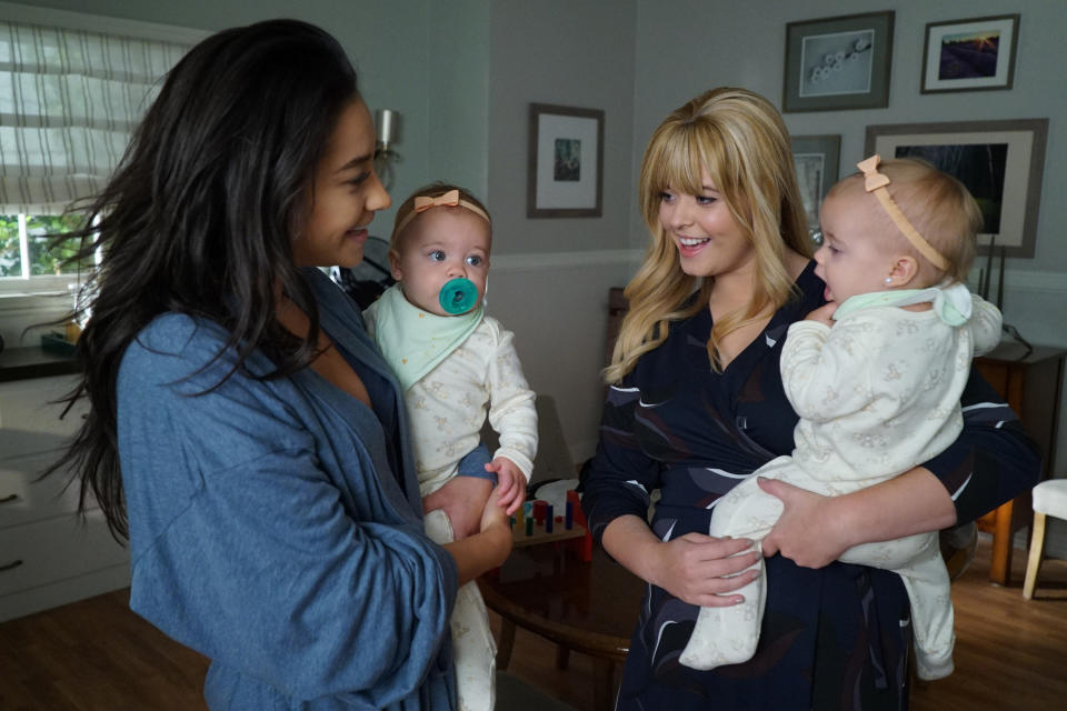 Emily and Alison in "The Perfectionists" holding their babies.