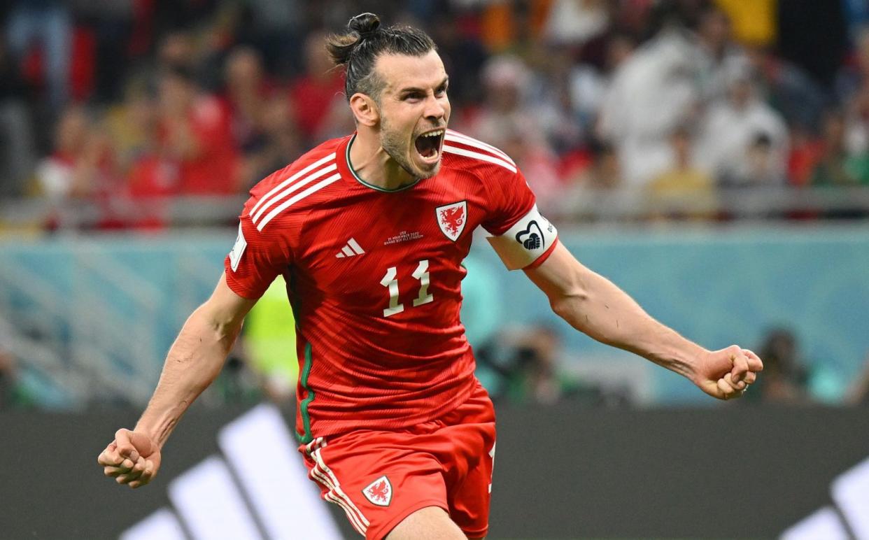 Gareth Bale celebrates scoring his penalty against the USA - Gareth Bale stirs from his torpor to equalise with late penalty for Wales against USA - Clive Mason/Getty Images