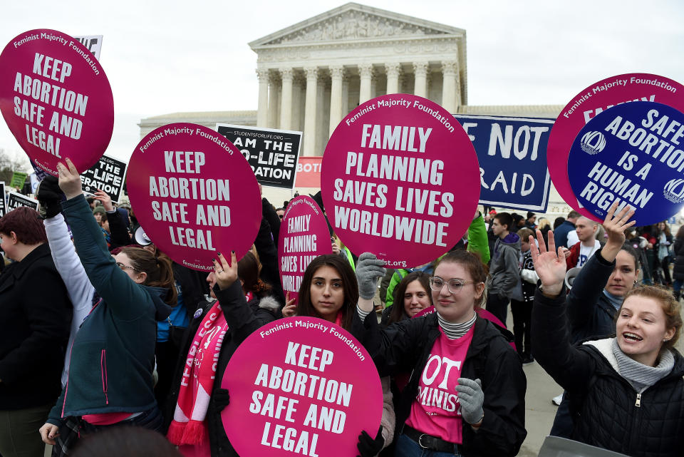 Anti-abortion and abortion rights activists square off outside the U.S. Supreme Court in Washington. Under the high court's new conservative majority, abortion rights are in jeopardy. (Photo: OLIVIER DOULIERY/AFP via Getty Images)