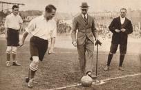 <p>The Duke of York kicks off a charity football game between Tottenham Hotspurs and Corinthians.</p>