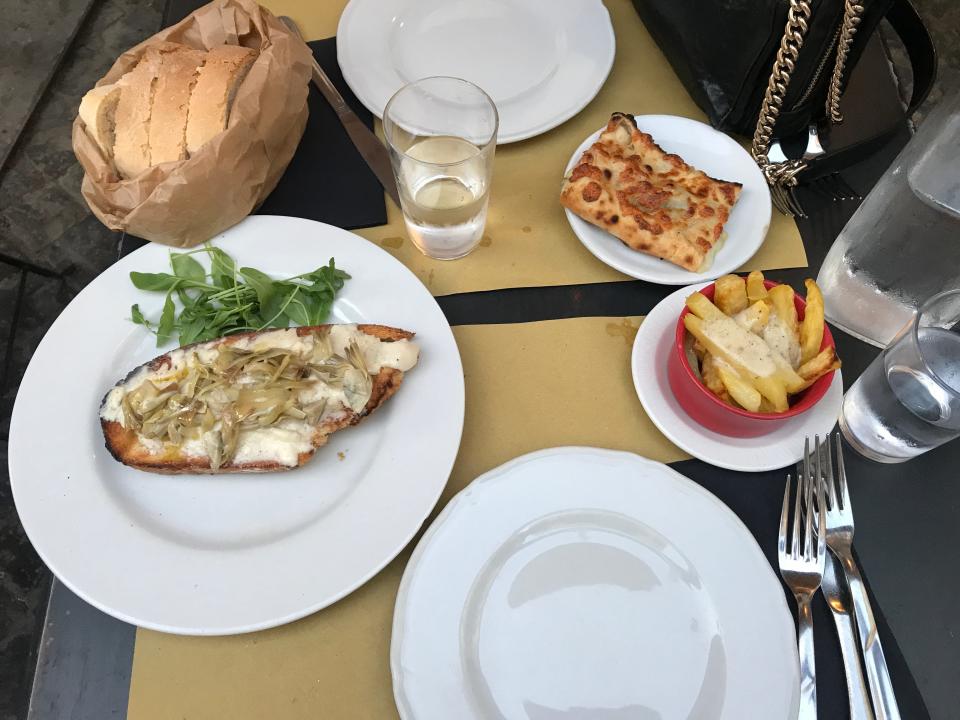 appetizers and bread at a restaurant in rome italy