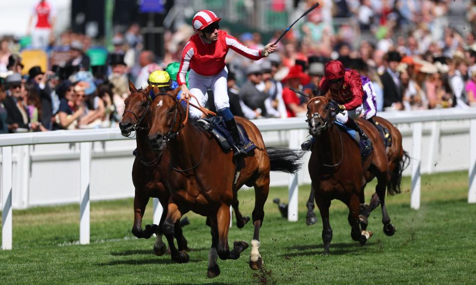 <span>Callum Shepherd salutes the Ascot crowd after riding Isle Of Jura to victory in the Hardwicke Stakes.</span><span>Photograph: Andrew Redington/Getty Images</span>