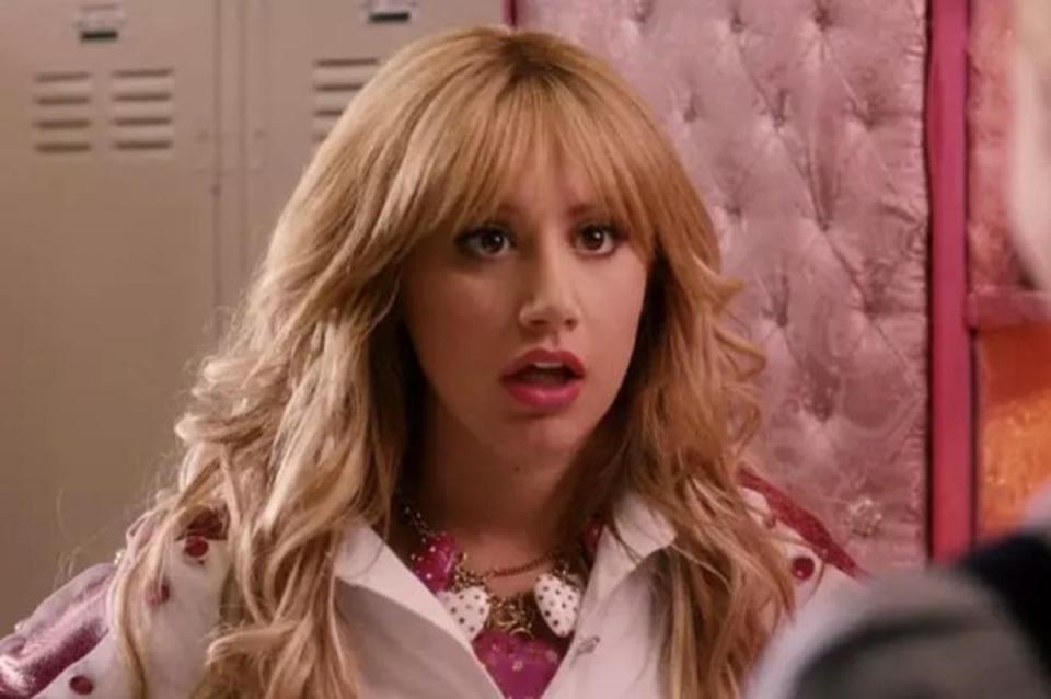 Screenshot of Sharpay in front her locker looking shocked