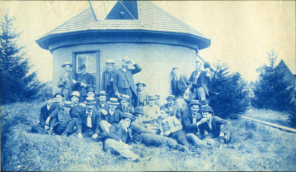 Men pose outside of MSU’s first observatory, circa 1888. The observatory is located behind where Willis House now stands on MSU’s campus, just south of Grand River in North Neighborhood.